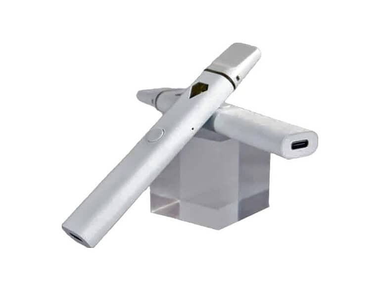 White disposable vape pen on a clear stand