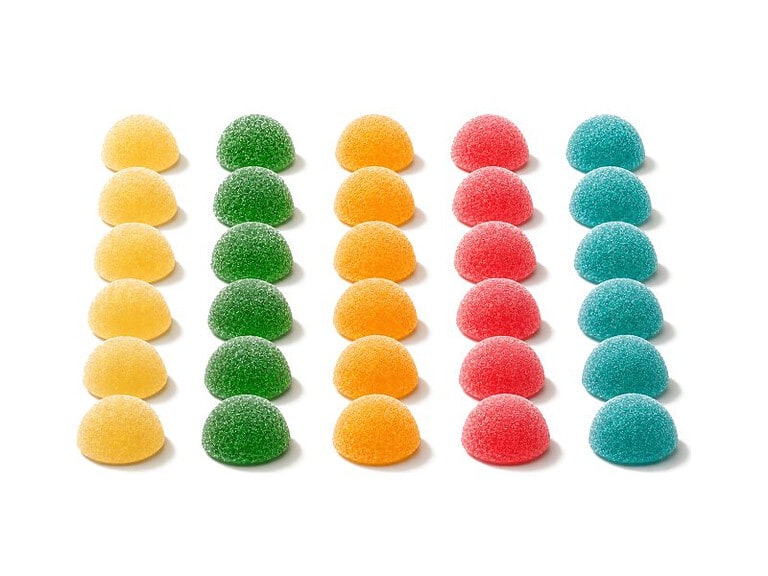 Rows of hemp gummies in five flavors